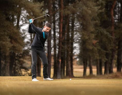 How Do You Put Backspin on a Golf Ball, and Why Does It Feel Like Trying to Tame a Tornado?